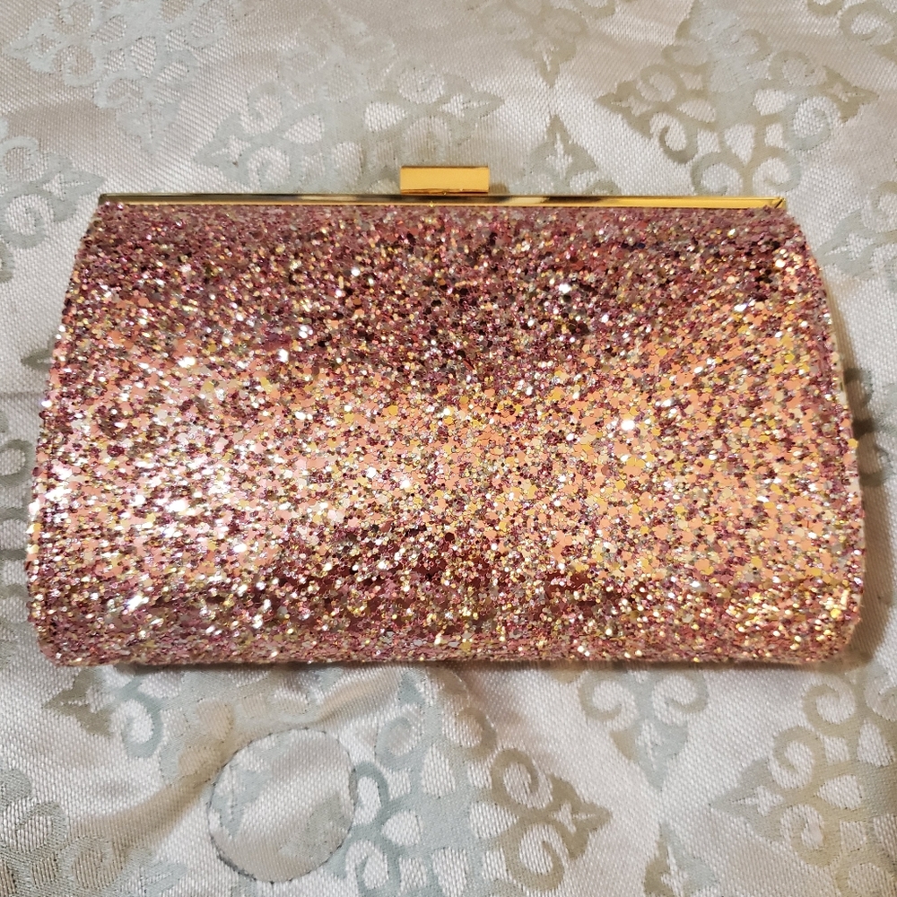 INC rose gold clutch